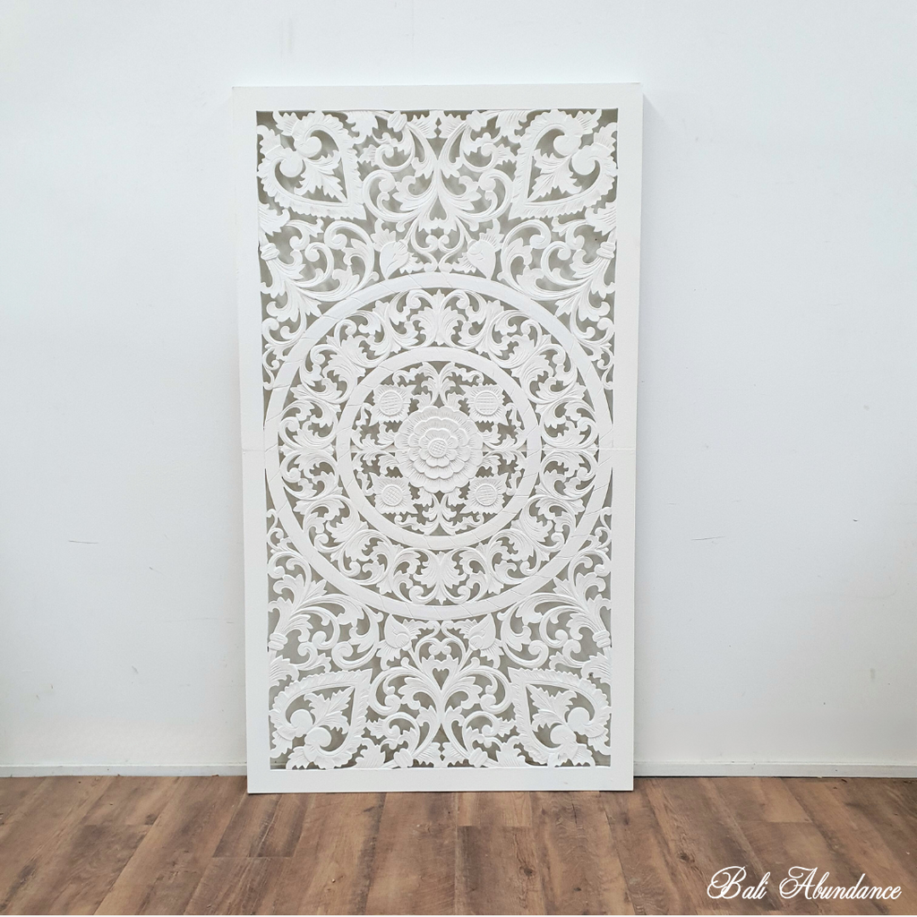 white hand carved wall panel